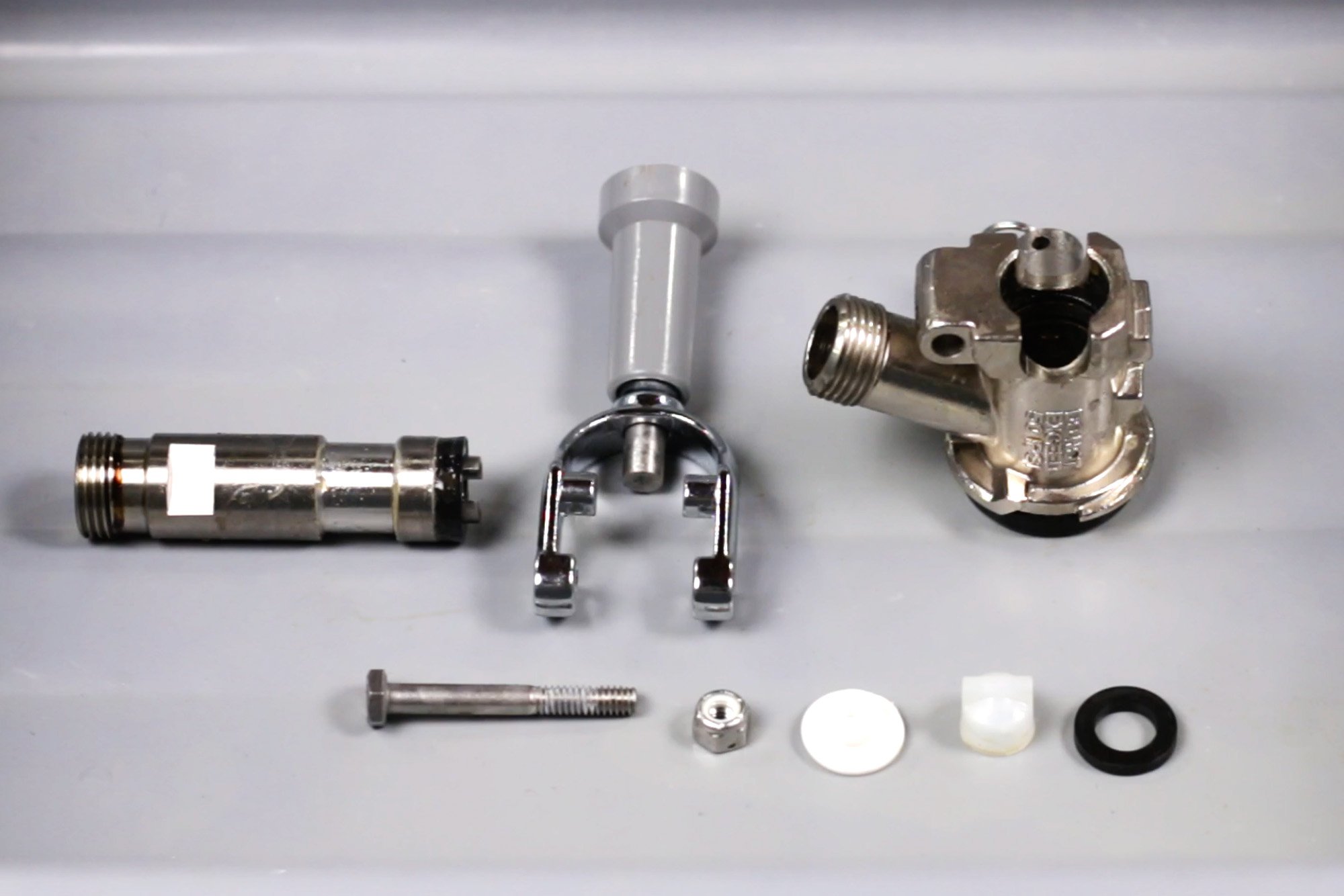 disassembled keg coupler after cleaning