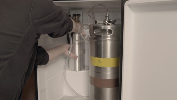 Step 12- Carefully place CO2 tank in kegerator fridge.