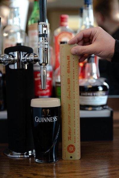 The foam atop the Irish pour was measured at exactly 13/16”.