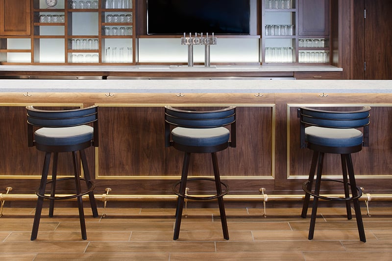 Example of a Brushed Brass bar rail installed at a bar